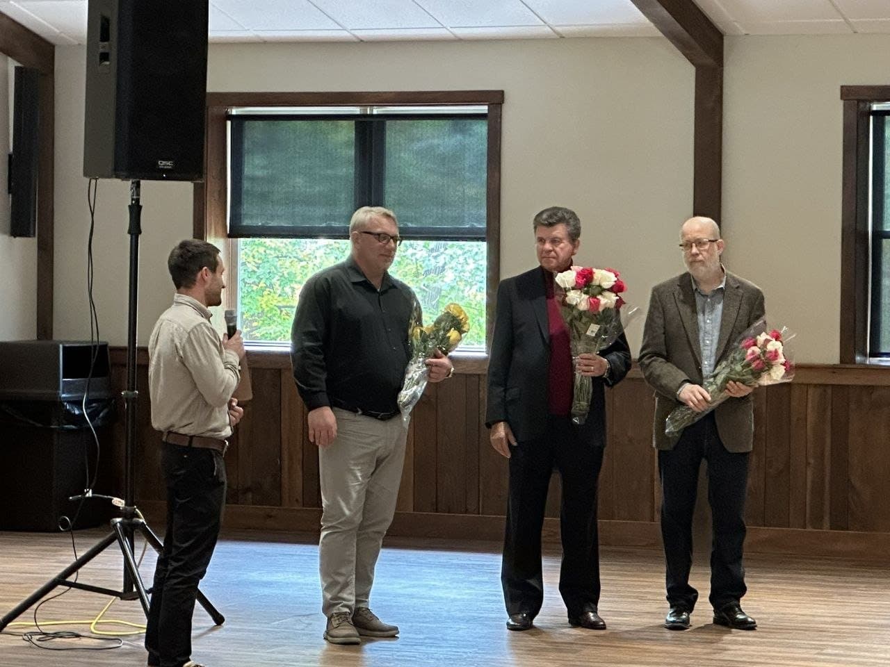 Our pastors receiving flowers from the congregation for Pastor Appreciation Day
